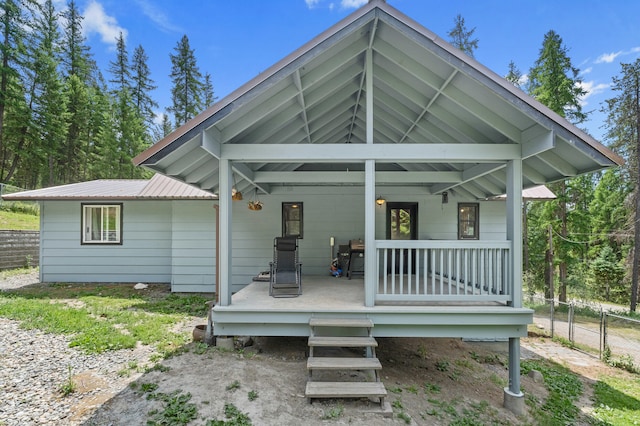 2184 Clugston Onion Creek Rd, Colville, WA 99114 - back of house with a metal roof and covered porch