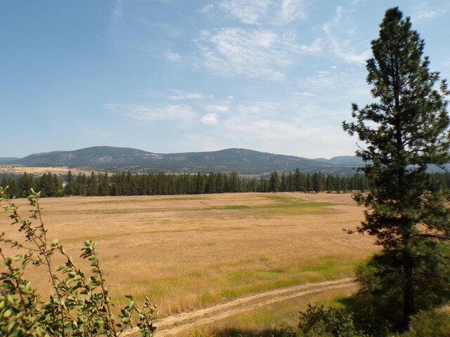 view of mountain feature featuring a rural view