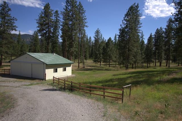 1425 Chapin Rd N, Evans, WA 99126 - view of pole building featuring a wooded view