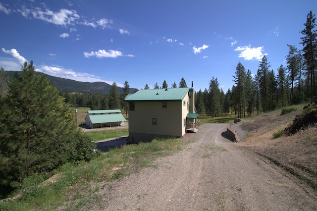1425 Chapin Rd N, Evans, WA 99126 - view of road featuring a mountain view and a view of trees