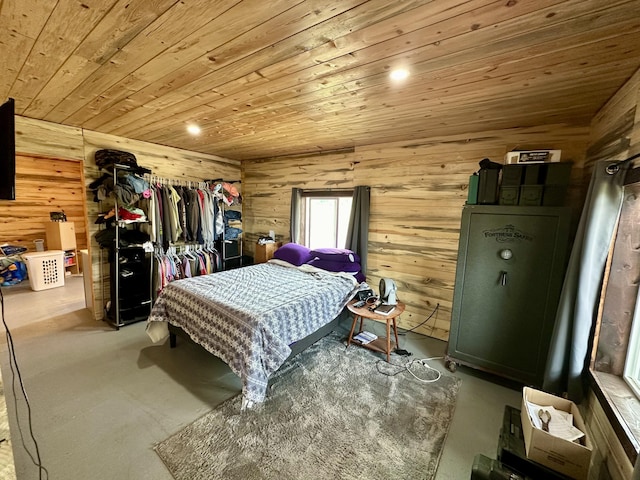 6171 Coyote Canyon Rd Unit L, Fruitland, WA 99129 - bedroom featuring wood ceiling, wood walls, and concrete floors