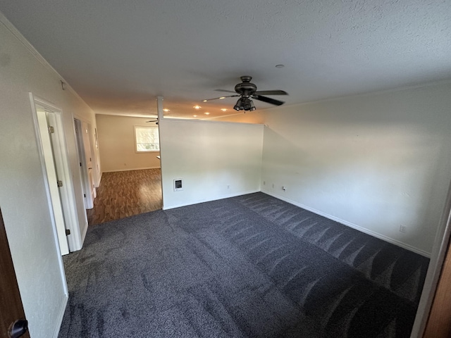 360 E 7th Ave, Colville, WA 99114 - spare room featuring dark colored carpet and a ceiling fan