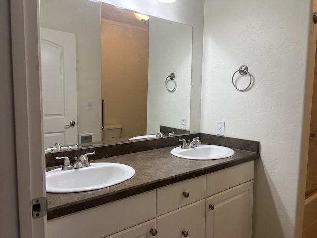 360 E 7th Ave, Colville, WA 99114 - bathroom with double vanity and toilet