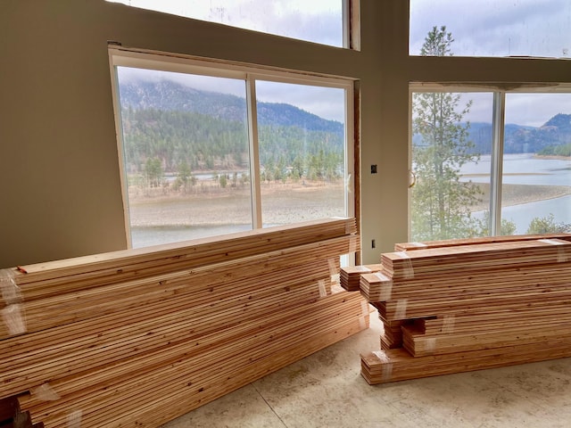 4070 Northport Flat Creek Rd, Northport, WA 99157 - unfurnished sunroom with a water and mountain view