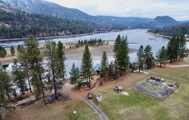 aerial view featuring a water and mountain view