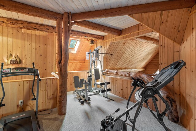 2751 Rathbun Way, Chewelah, WA 99109 - exercise area with a skylight, wood ceiling, wood walls, and carpet floors