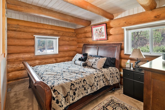 2751 Rathbun Way, Chewelah, WA 99109 - carpeted bedroom featuring log walls, beam ceiling, and wood ceiling