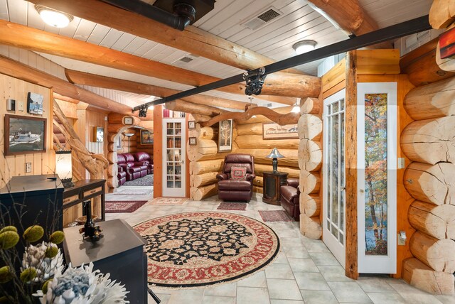 2751 Rathbun Way, Chewelah, WA 99109 - tiled living room with french doors, beam ceiling, visible vents, and wooden ceiling