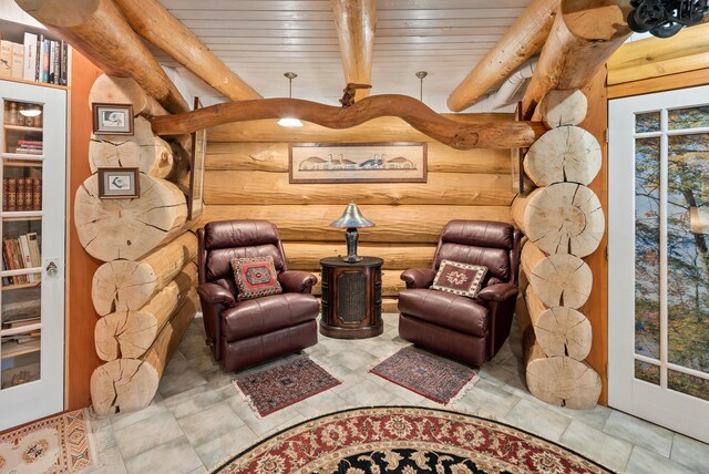2751 Rathbun Way, Chewelah, WA 99109 - living area with beam ceiling, wood ceiling, and rustic walls
