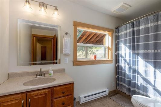 bathroom with toilet, a shower with shower curtain, visible vents, vanity, and baseboard heating