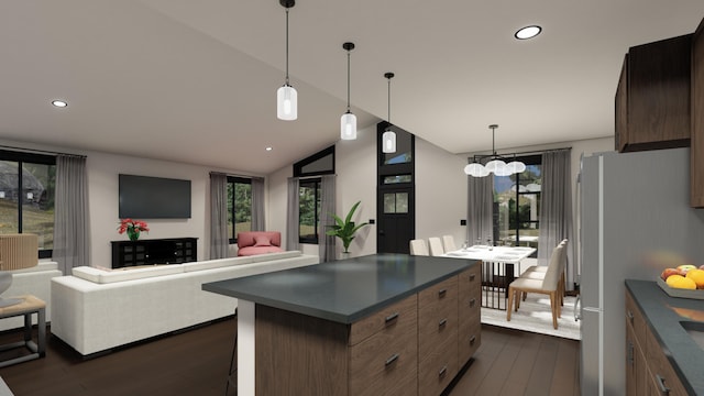 715 Palmer Ln, Chewelah, WA 99109 - kitchen featuring freestanding refrigerator, dark wood-style flooring, dark countertops, vaulted ceiling, and a center island