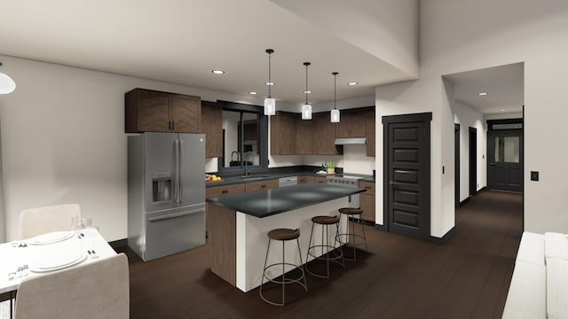 715 Palmer Ln, Chewelah, WA 99109 - kitchen with stainless steel fridge with ice dispenser, a kitchen bar, dark countertops, under cabinet range hood, and dark wood-style floors