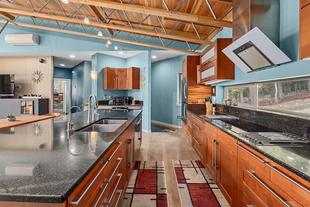 kitchen with brown cabinetry, wood ceiling, wall chimney exhaust hood, a wall mounted air conditioner, and a sink