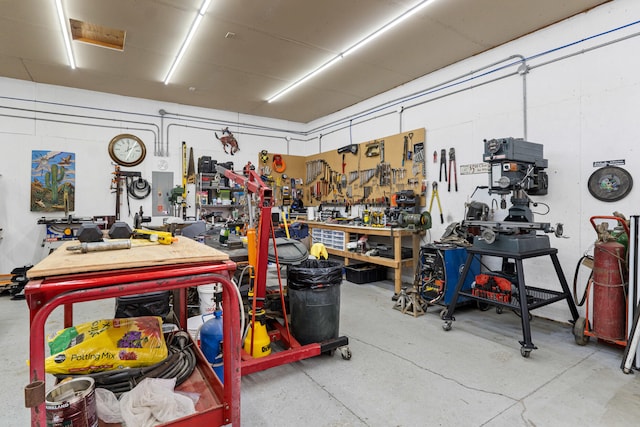 garage with a workshop area