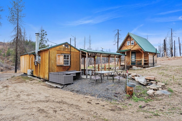 exterior space with an outbuilding