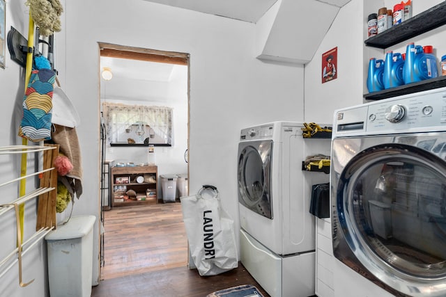 3063 Hungry Hill Rd, Kettle Falls, WA 99141 - clothes washing area featuring independent washer and dryer and wood finished floors