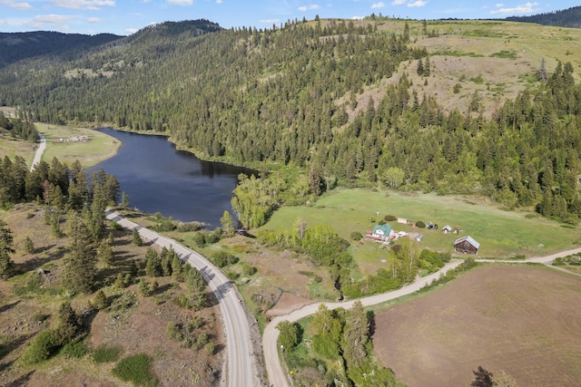 3063 Hungry Hill Rd, Kettle Falls, WA 99141 - aerial view of property's location with a water and mountain view and a forest