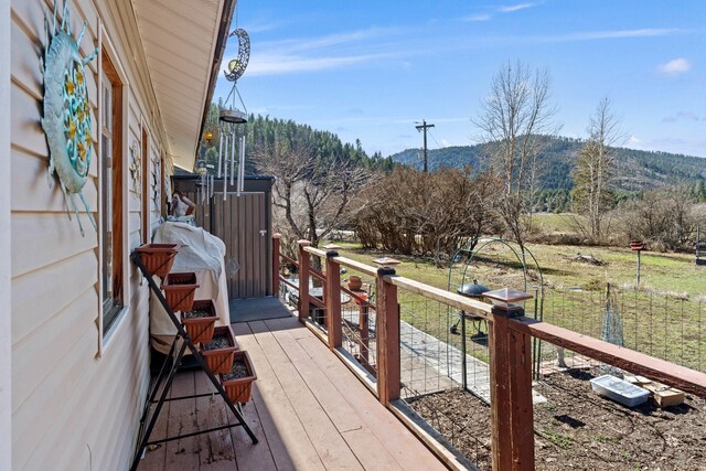 3063 Hungry Hill Rd, Kettle Falls, WA 99141 - wooden terrace with a mountain view