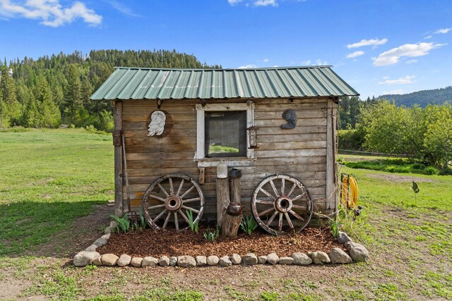 3063 Hungry Hill Rd, Kettle Falls, WA 99141 - view of outdoor structure with a view of trees and an outdoor structure