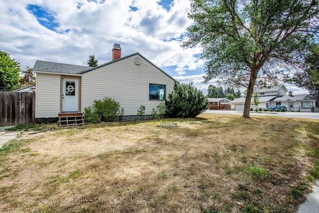 exterior space with a front yard