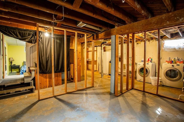 basement featuring washer and dryer