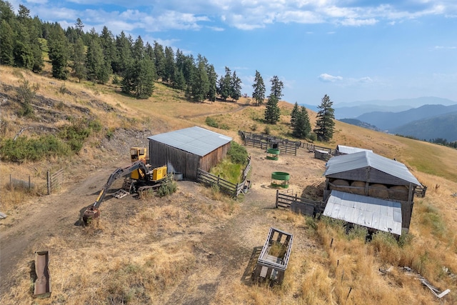bird's eye view with a rural view and a mountain view