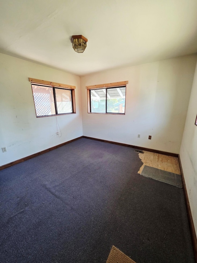 707 N 4th St W, Chewelah, WA 99109 - spare room with carpet
