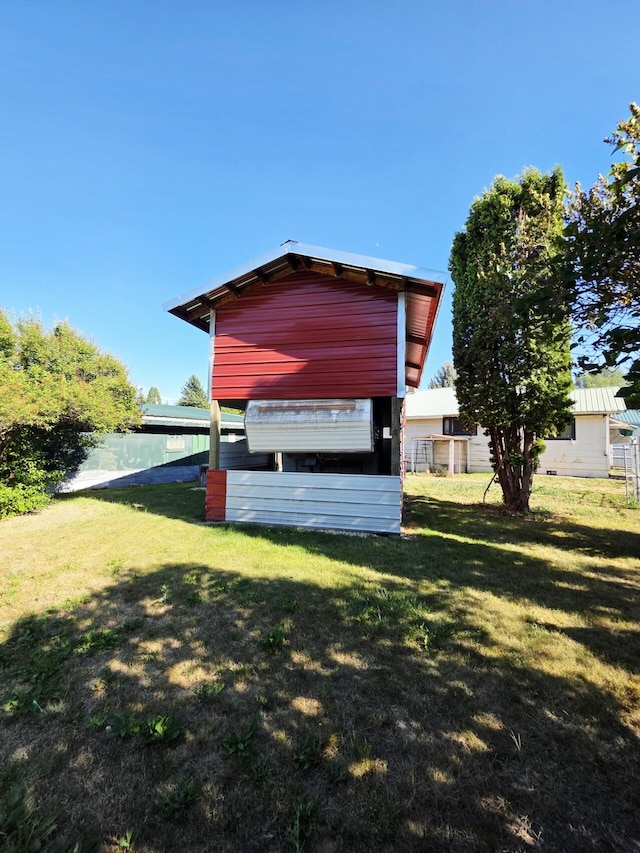 707 N 4th St W, Chewelah, WA 99109 - view of home's exterior featuring a lawn