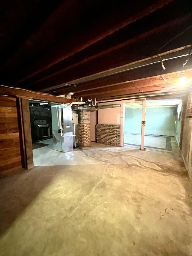707 N 4th St W, Chewelah, WA 99109 - unfinished basement featuring heating unit and water heater