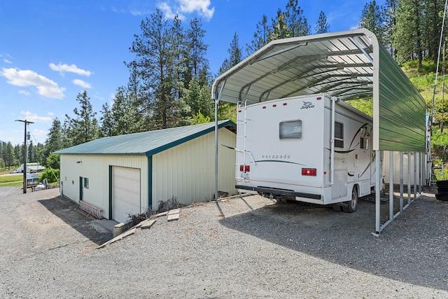 1427 Chapin Rd N, Evans, WA 99126 - view of parking / parking lot with a detached carport