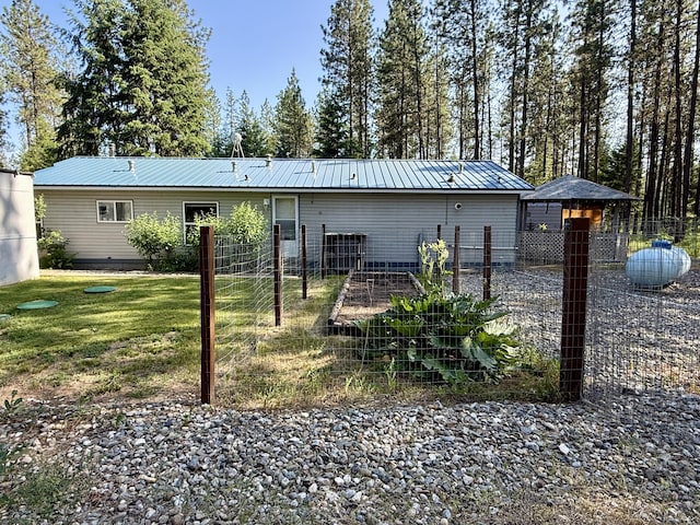 1874 Brooks Rd, Evans, WA 99126 - back of house featuring a metal roof