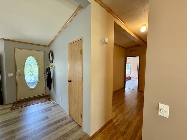 1874 Brooks Rd, Evans, WA 99126 - foyer with ornamental molding, lofted ceiling, and wood finished floors