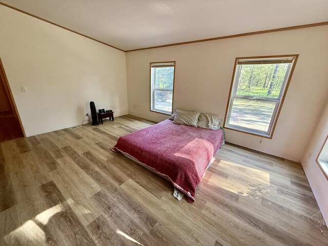 1874 Brooks Rd, Evans, WA 99126 - bedroom with wood finished floors and crown molding
