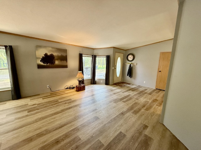1874 Brooks Rd, Evans, WA 99126 - unfurnished living room with wood finished floors and crown molding