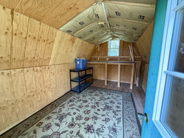 1874 Brooks Rd, Evans, WA 99126 - additional living space with wood walls, vaulted ceiling, and wood finished floors
