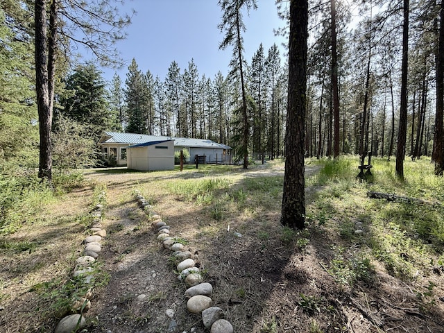 1874 Brooks Rd, Evans, WA 99126 - view of yard featuring a wooded view