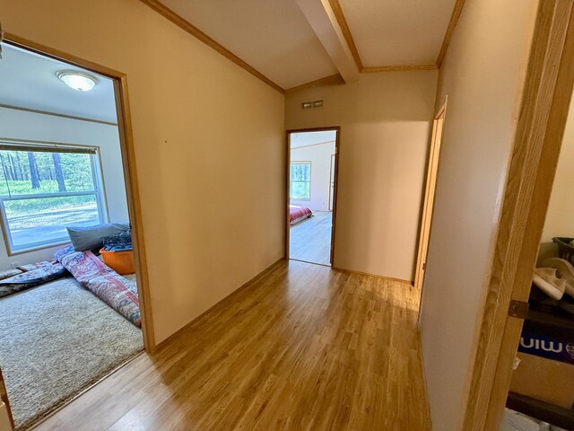 1874 Brooks Rd, Evans, WA 99126 - hallway with light wood-style floors, healthy amount of natural light, and crown molding