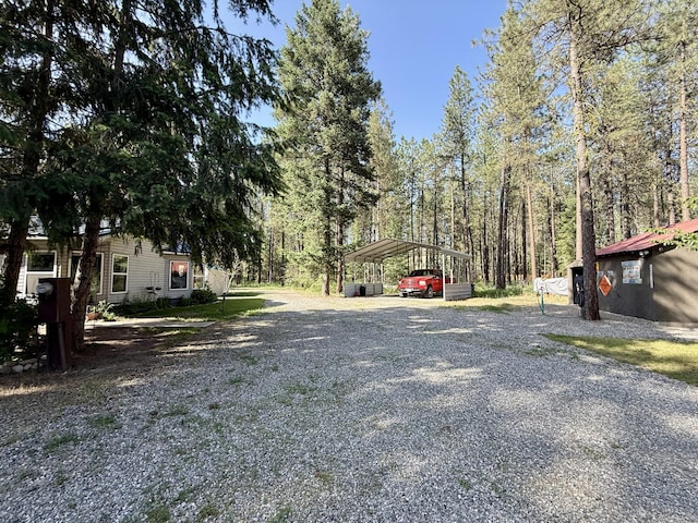 1874 Brooks Rd, Evans, WA 99126 - view of yard with driveway and a carport