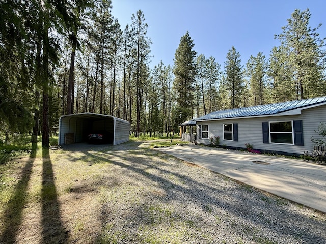 1874 Brooks Rd, Evans, WA 99126 - view of yard featuring gravel driveway and a carport