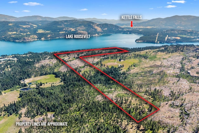 76 Kifer Rd, Kettle Falls, WA 99141 - aerial view of property and surrounding area with a water and mountain view and property boundaries highlighted