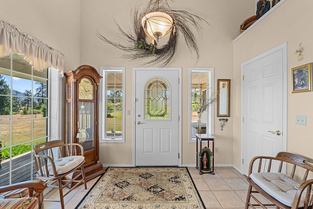 76 Kifer Rd, Kettle Falls, WA 99141 - entrance foyer with plenty of natural light, a towering ceiling, and light tile patterned floors