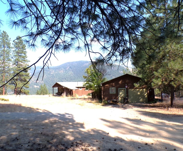 exterior space featuring a mountain view