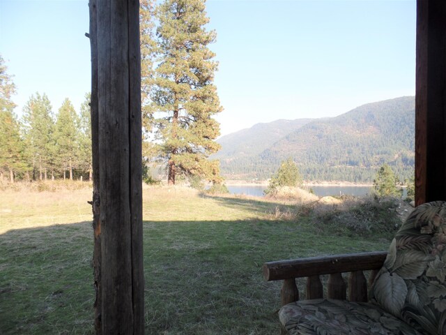 view of mountain feature featuring a water view