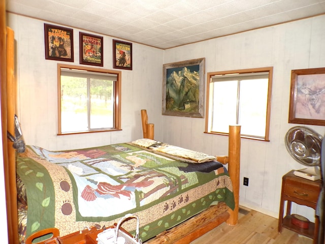 bedroom with light wood-type flooring