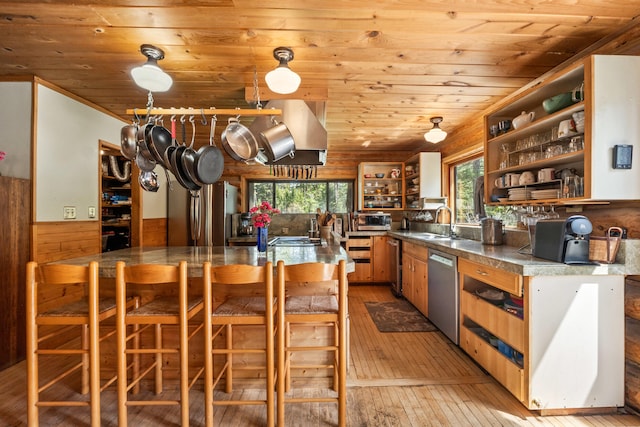 kitchen featuring open shelves, wainscoting, wooden ceiling, and stainless steel appliances