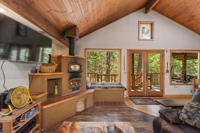 living area with high vaulted ceiling, wooden ceiling, and hardwood / wood-style flooring