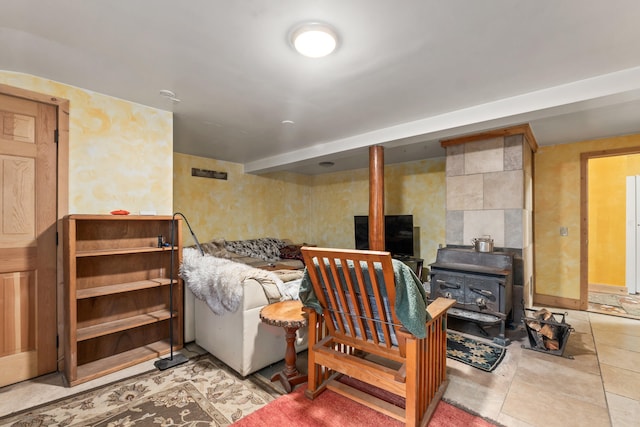 bedroom with a wood stove