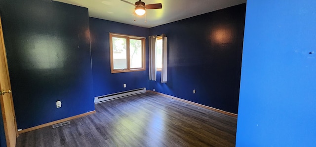 510 S Elm St, Colville, WA 99114 - empty room with baseboard heating, wood finished floors, ceiling fan, and baseboards
