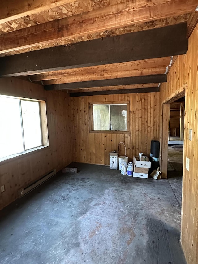 3928 Cedar Creek Rd, Colville, WA 99114 - spare room with baseboard heating, healthy amount of natural light, and concrete floors