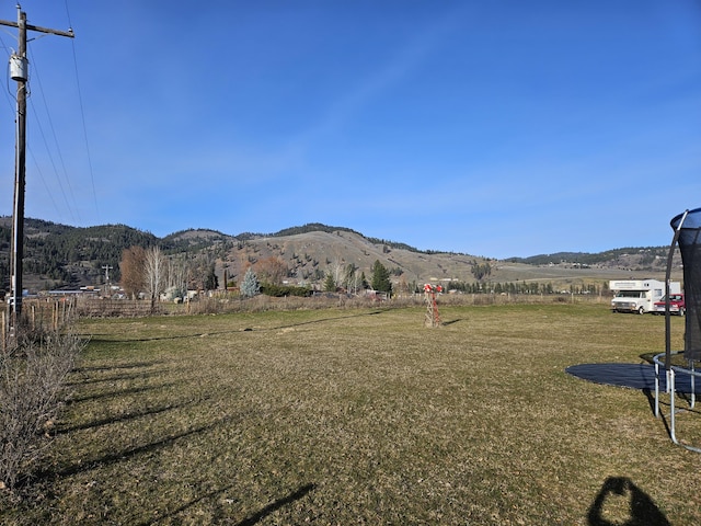 view of mountain feature featuring a rural view